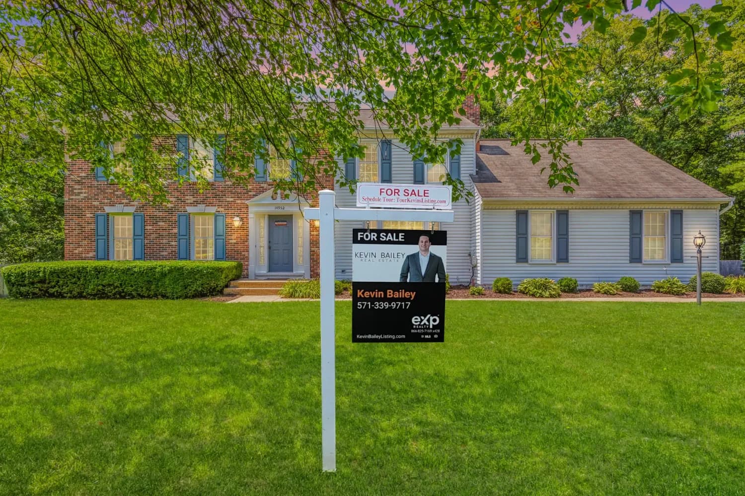 A Kevin Bailey listing with a sold sign in the front yard