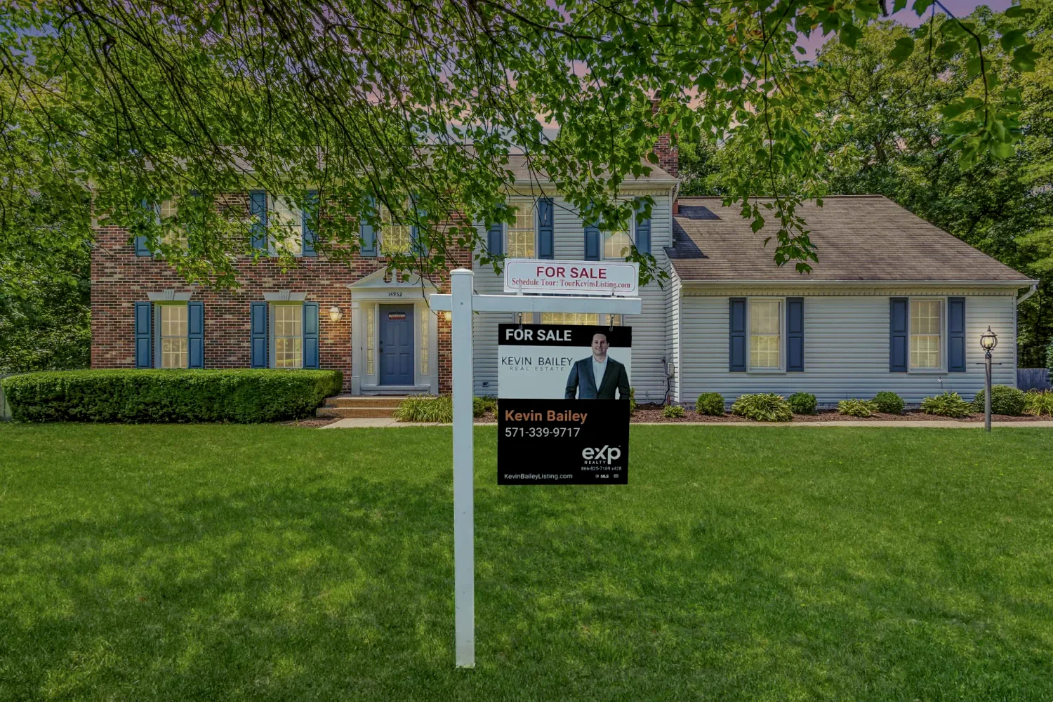 A Kevin Bailey for-sale sign in front of a listed home.
